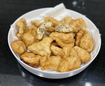 High angle view of serving food in plate on table