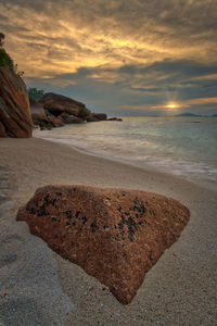 Scenic view of sea against sky during sunset