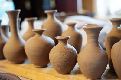 Close-up of pots at workshop