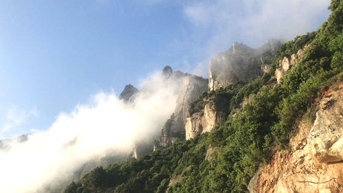 Low angle view of mountains against sky