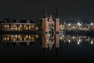 The medieval water gate in sneek in the netherlands at night