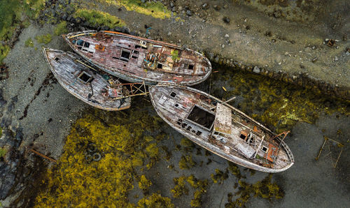 High angle view of abandoned boats on land