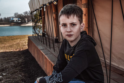 Portrait of young man in water