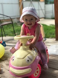 Portrait of cute girl with toy