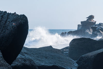 Scenic view of sea against clear sky