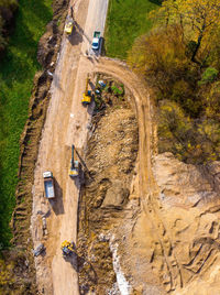 High angle view of road amidst trees