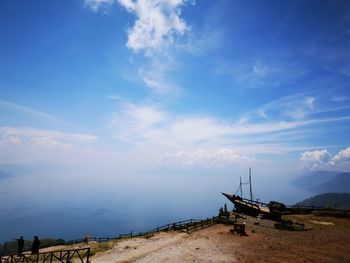 Scenic view of sea against blue sky