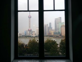 City viewed through window