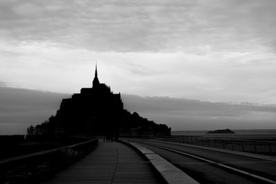 Road leading towards building