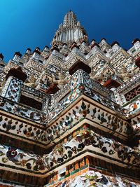 Low angle view of ornate building against sky