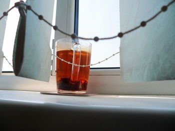 Close-up of tea in glass on table