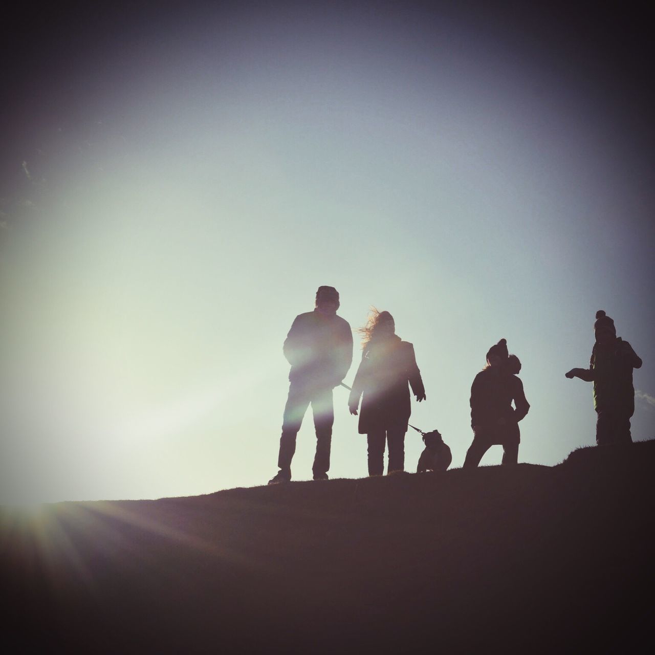 togetherness, silhouette, copy space, lifestyles, full length, men, leisure activity, clear sky, friendship, mountain, solitude, tranquility, nature, outdoors, remote, person, sky, tranquil scene, scenics