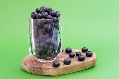 Close-up of fruits in glass on table