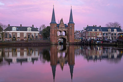 The medieval water gate in sneek in the netherlands at sunset