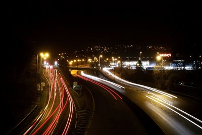 Blurred motion of car on road at night