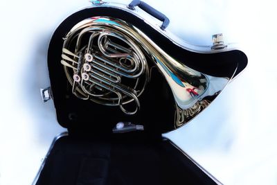 Close-up of person standing on metallic structure