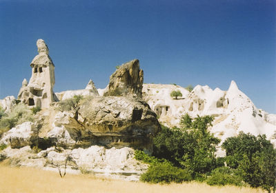 Rock formations against blue sky