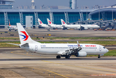 View of airplane at airport runway