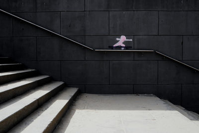 High angle view of person on staircase against building