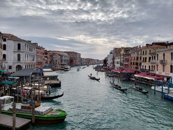 Boats moored at harbor