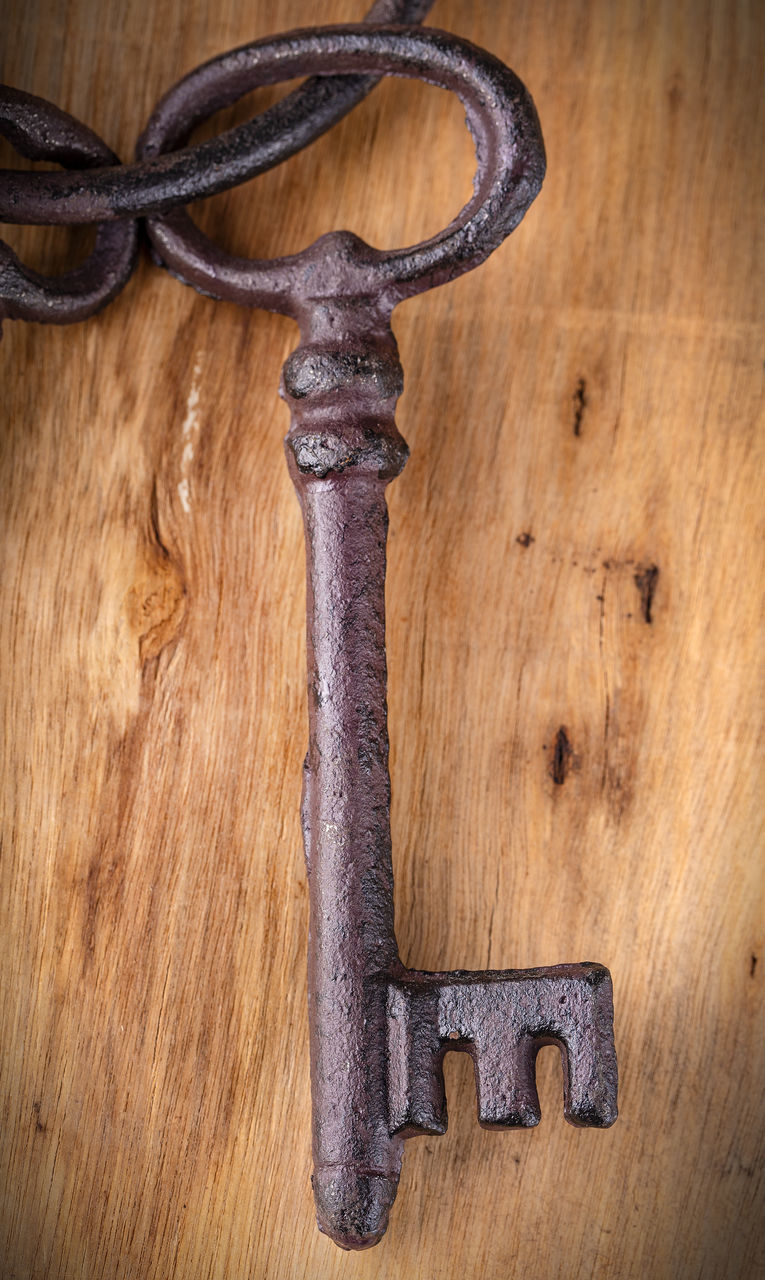 CLOSE-UP OF OLD WOODEN DOOR WITH HANDLE