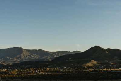 Scenic view of mountains against clear sky