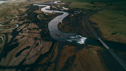 High angle view of river amidst land