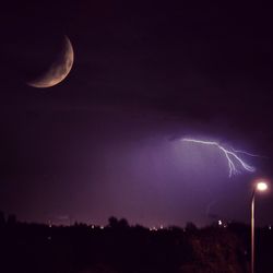 Low angle view of moon in sky