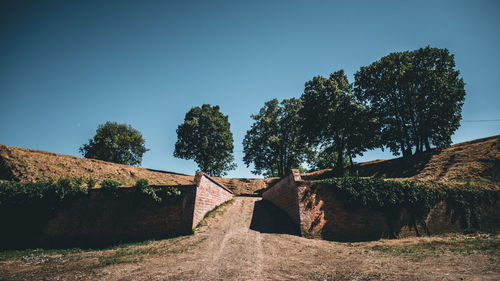 Old ruins against clear blue sky