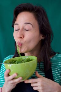 Portrait of woman eating food