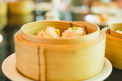 Close-up of dim sum in steamer