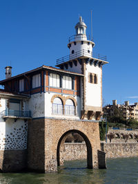 View of historical building against clear blue sky