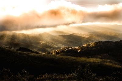 Scenic view of landscape against sky during sunset