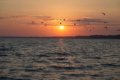 Scenic view of sea against sky during sunset