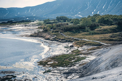 Scenic view of sea and mountains