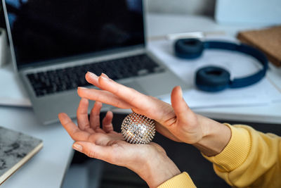 Hand massage acupuncture su jok ball for hands and fingers. sujok, su jok, su-jok traditional