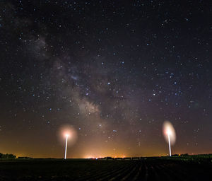 Scenic view of star field against sky at night