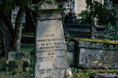 Text on stone at cemetery