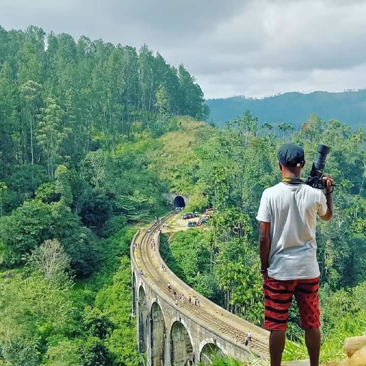 real people, rear view, standing, one person, tree, casual clothing, day, leisure activity, backpack, outdoors, nature, lifestyles, growth, landscape, mountain, sky, people