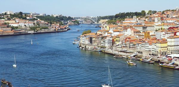 High angle view of townscape by sea