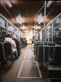 Rear view of people in train