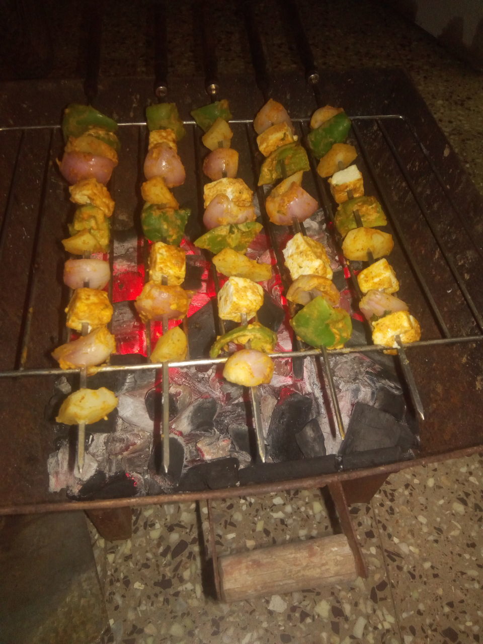 HIGH ANGLE VIEW OF VEGETABLES ON BARBECUE