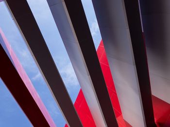 Low angle view of blue sky seen through glass