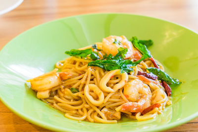 Close-up of noodles in plate on table