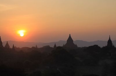 Panoramic view of a temple against sky during sunset