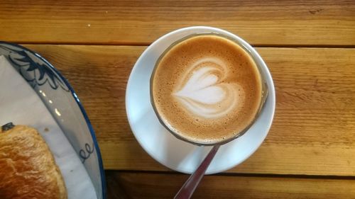 High angle view of cappuccino on table