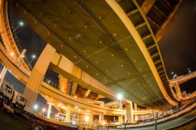 Low angle view of illuminated bridge