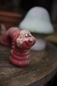 Figurine on wooden table