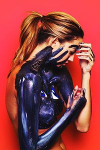 Woman with blue body paint