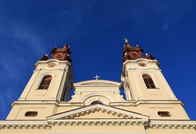 Low angle view of building against blue sky